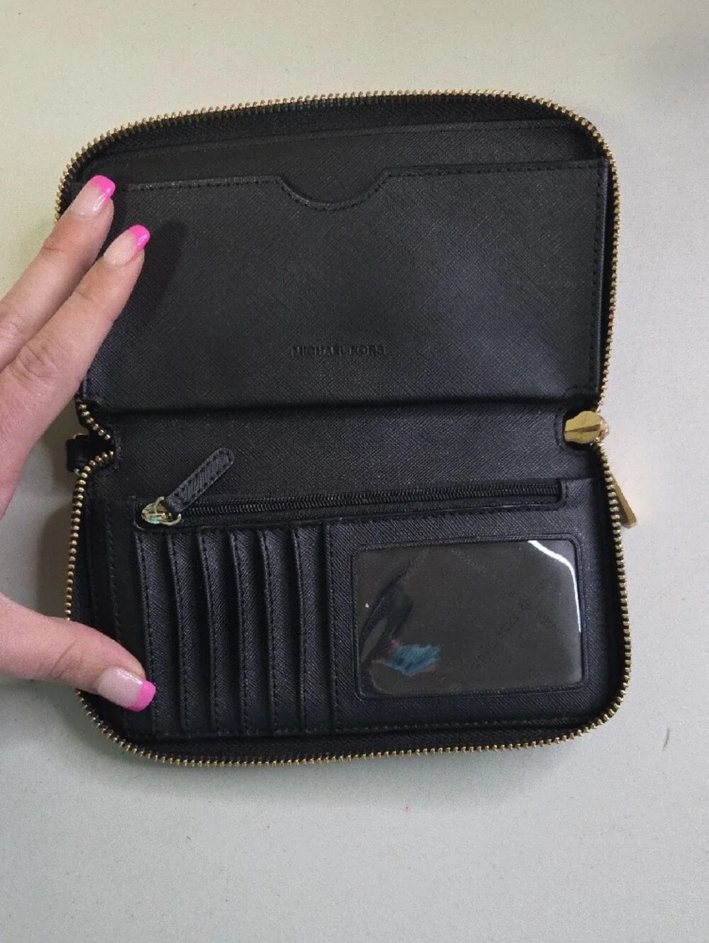 Michael Kors Black Leather Zip-Around Wallet with Floral Emboss and Gold Logo